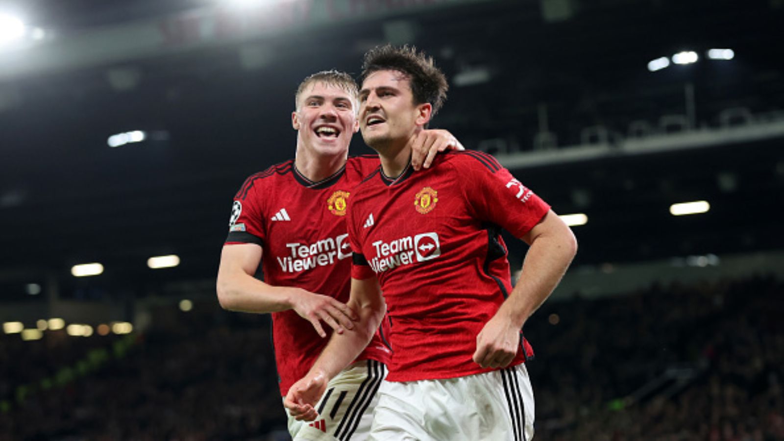 Champions League Round-up: Harry Maguire shines for Manchester United, Arsenal, Real Madrid secure crucial wins Manchester United defender Harry Maguire celebrating a Champions League goal.