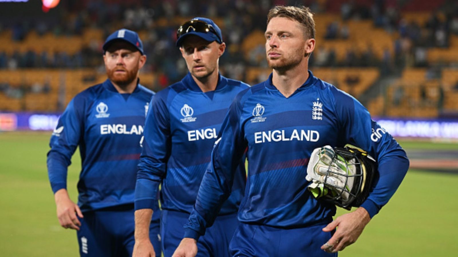 Is Jos Buttler's captaincy in danger after England's horrendous display in ODI World Cup? He answers Jonny Bairstow, Jos Buttler and Joe Root of England cut dejected figures following the ICC Men's Cricket World Cup India 2023 between England and Sri Lanka at M. Chinnaswamy Stadium on October 26, 2023 in Bangalore, India.