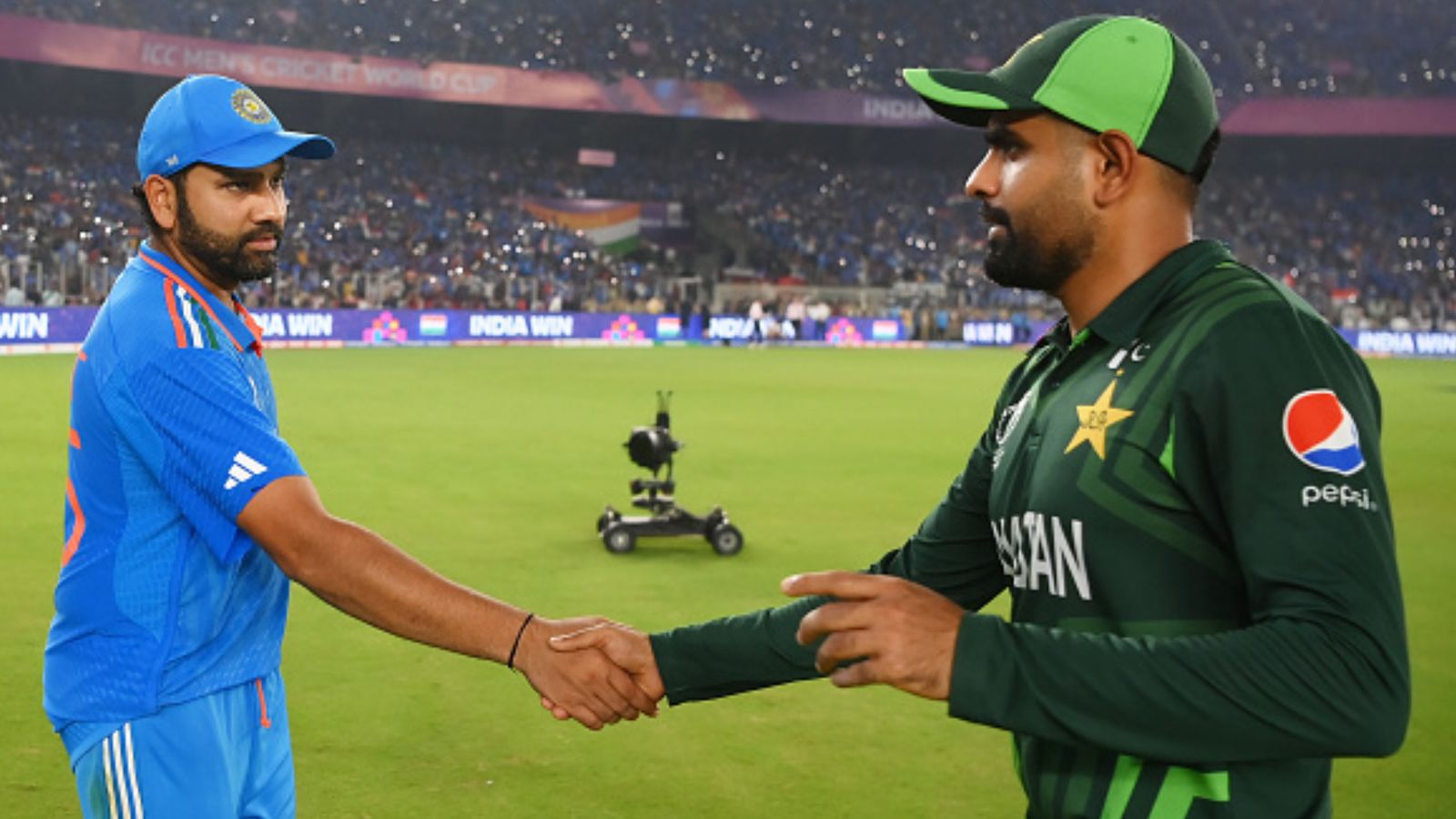 'Maturity isn't quite there..': Pakistan legend Mohammad Hafeez wants Babar Azam to learn knack of captaincy from Rohit Sharma India captain Rohit Sharma (left) and Pakistan skipper Babar Azam in this frame.