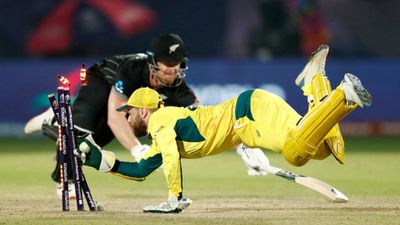 Australia beat New Zealand in nerve-jangling 'match of the tournament' by 5 runs; Head's century overshadows Ravindra's ton and Neesham's herculean effort Jimmy Neesham of New Zealand is run out by Wicketkeeper Marnus Labuschagne of Australia during the ICC Men's Cricket World Cup India 2023 Group Stage Match between Australia and New Zealand at HPCA Stadium on October 28, 2023 in Dharamsala, India.