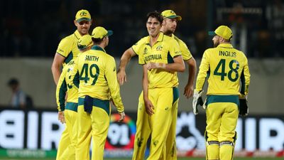 'They're really starting to take shape': Aaron Finch fires warning to other teams after Australia's resurgence Pat Cummins of Australia celebrates with teammates after taking the wicket of Matt Henry of New Zealand (not pictured) during the ICC Men's Cricket World Cup India 2023 Group Stage Match between Australia and New Zealand at HPCA Stadium on October 28,