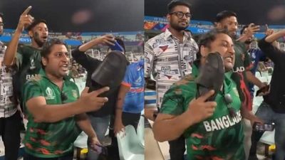 Watch: Enraged Bangladesh fan whacks himself with shoe, expresses intense anger and brutally slams players after horrendous display; video goes viral Bangladesh fan inside Eden Gardens Stadium in Kolkata.