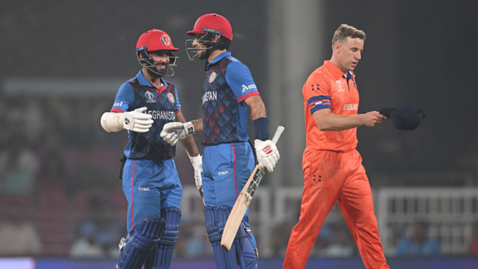 Afghanistan ride on troika of Nabi, Rahmat, Hashmatullah to obliterate Netherlands, dent Pakistan's semis hopes Rahmat Shah of Afghanistan celebrates his half century with teammate Hashmatullah Shahidi during their ICC Men's Cricket World Cup India 2023 against Netherlands at BRSABVE Cricket Stadium on November 03, 2023 in Lucknow, India. (Getty)