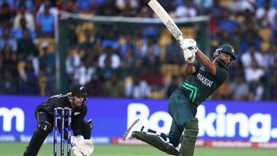 PAK vs NZ: What will be Pakistan's target if match gets reduced to 30, 40 or 45 overs due to run? Know the maths here Fakhar Zaman (right) of Pakistan plays a shot as Tom Latham of New Zealand keeps during the ICC Men's Cricket World Cup India 2023 between New Zealand and Pakistan at M. Chinnaswamy Stadium on November 04, 2023 in Bangalore, India. (Photo by Matthew