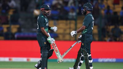 PAK vs NZ: Pakistan handed revised target against New Zealand in truncated match, know all the details here Babar Azam (left) and Fakhar Zaman of Pakistan interact during the ICC Men's Cricket World Cup India 2023 between New Zealand and Pakistan at M. Chinnaswamy Stadium on November 04, 2023 in Bangalore, India. (Photo by Matthew Lewis-ICC/ICC via Getty