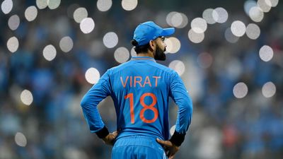 Rahul Dravid breaks silence on fans' request to bowl Virat Kohli, says, 'We can have a wrong-footed menace' India batter Virat Kohli with fans in the background.