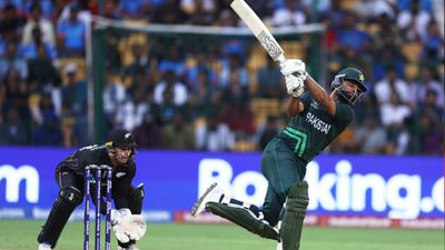 Fakhar Zaman's scorching ton propels Pakistan to 21-run win over Kiwis in rain-curtailed match to rekindle semis hopes Pakistan's Fakhar Zaman (right) plays a shot as Tom Latham of New Zealand keeps during the ICC Men's Cricket World Cup India 2023 between New Zealand and Pakistan at M. Chinnaswamy Stadium on November 04, 2023 in Bangalore, India. (Getty)