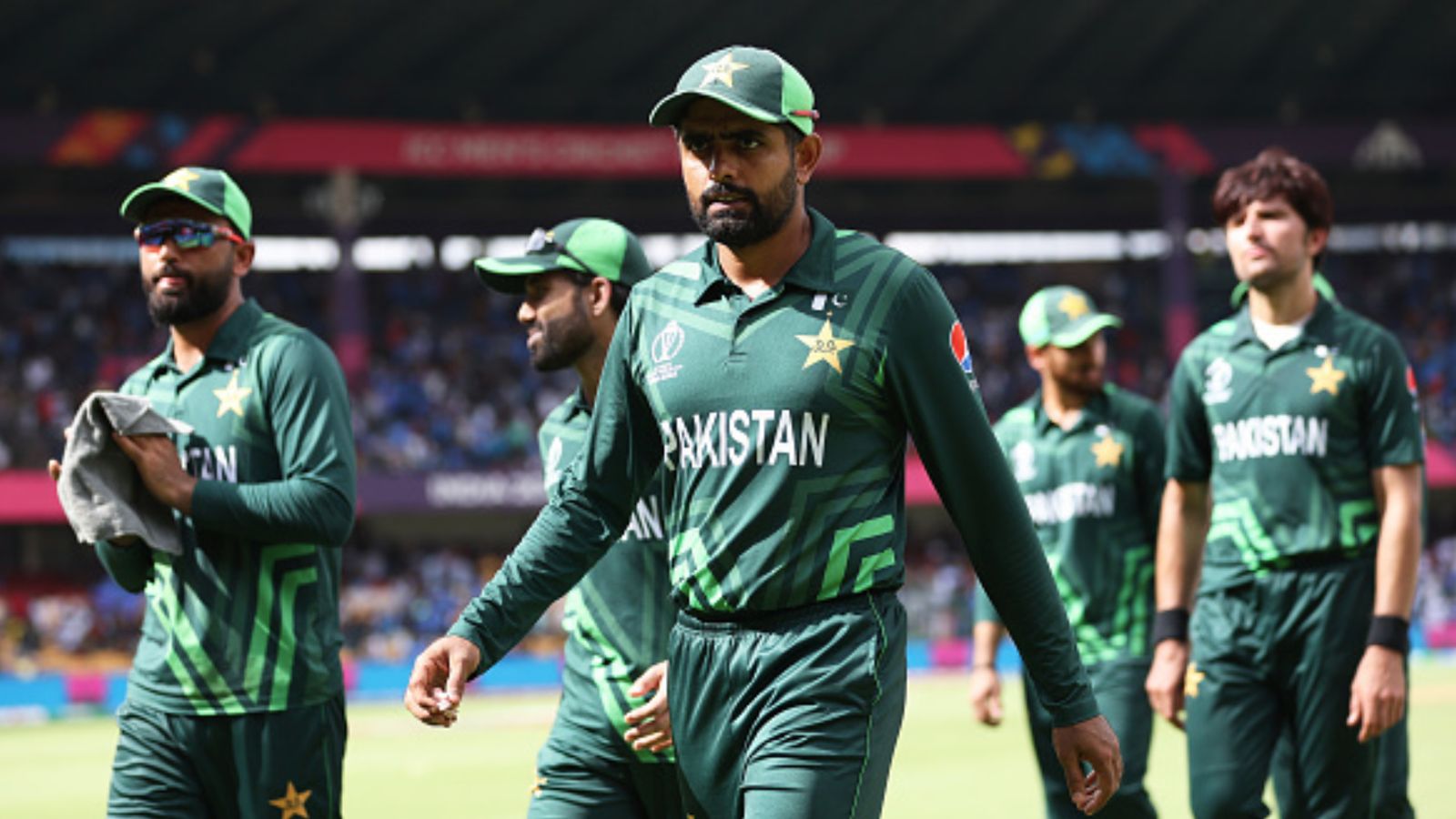 EXPLAINED: How Babar Azam's Pakistan can still qualify for World Cup 2023's semifinals after stunning win over New Zealand? Pakistan skipper Babar Azam (centre) along with his teammates make their way off after fielding during the ICC Men's Cricket World Cup India 2023 between New Zealand and Pakistan at M. Chinnaswamy Stadium on November 04, 2023 in Bangalore, India. (Getty)