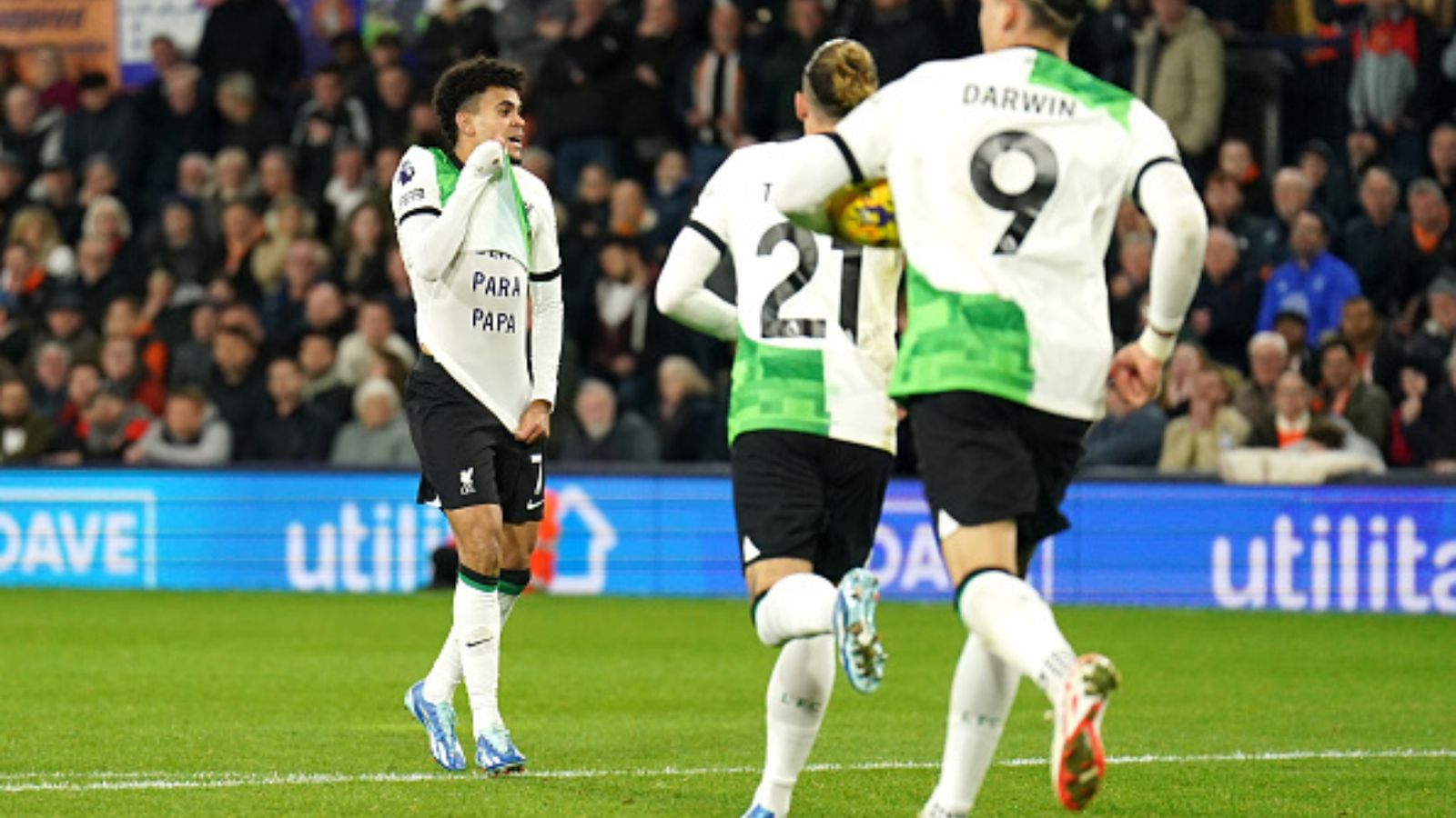 Liverpool forward Luis Diaz celebrates equaliser with emotional message pleading for release of kidnapped father Liverpool's Luis Diaz (L) celebrates scoring their side's goal with a shirt that reads 'Freedom for Dad' during a Premier League match.