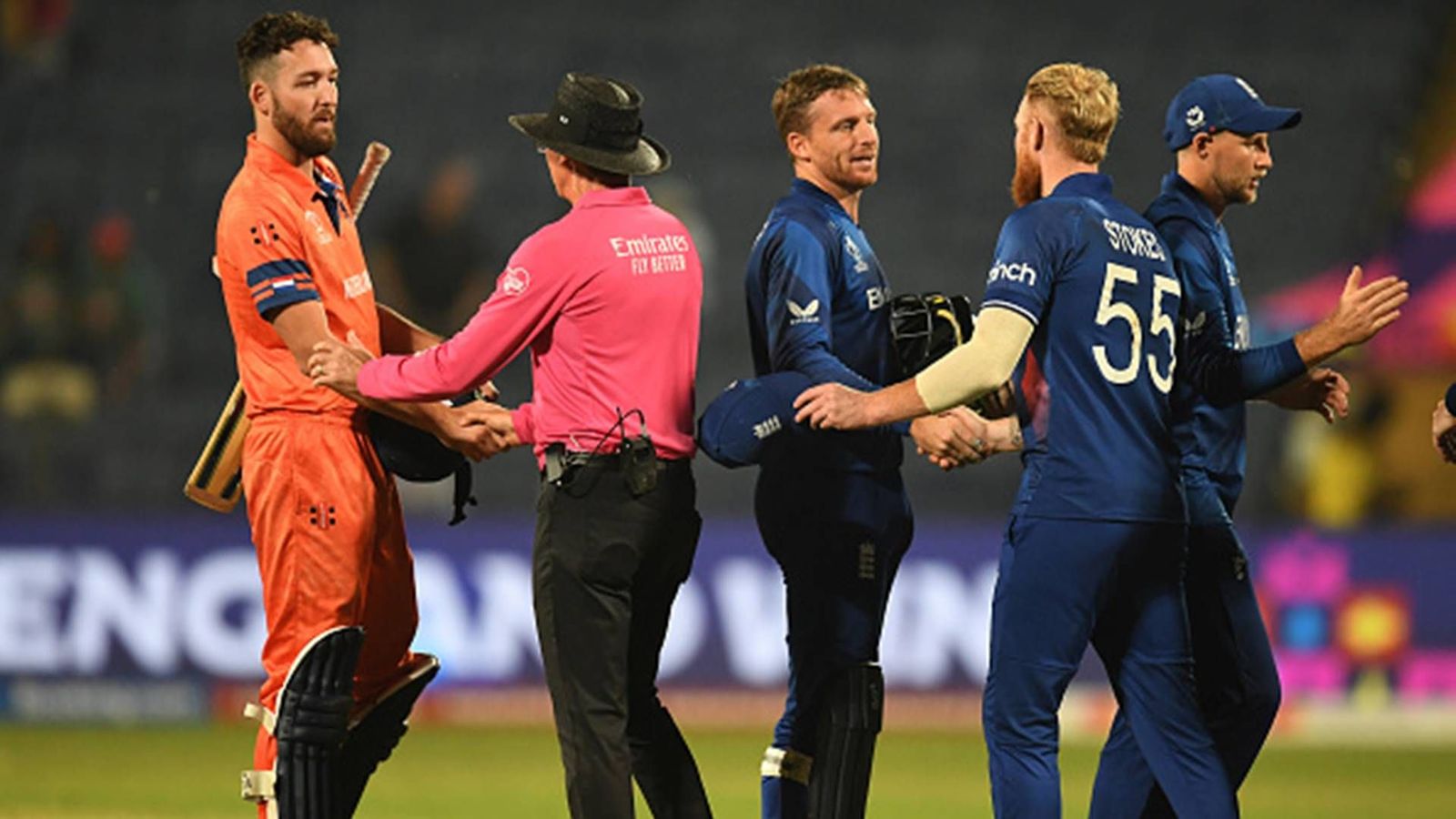 Ben Stokes' maiden World Cup hundred helps England win by 160 runs, keep Champions Trophy qualification hopes alive England and Netherlands players after the former's 160-run win in Pune (Getty Images)