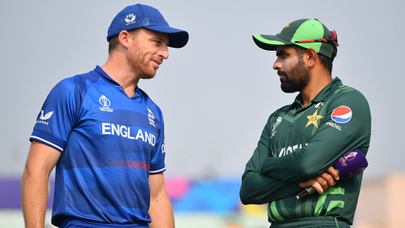 Pakistan Semifinal Qualification: Babar's brigade knocked out of World Cup after losing toss vs England; Here's how Jos Buttler (left) of England and Babar Azam of Pakistan interact ahead of the ICC Men's Cricket World Cup India 2023 between England and Pakistan at Eden Gardens on November 11, 2023 in Kolkata, India. (Getty Images)
