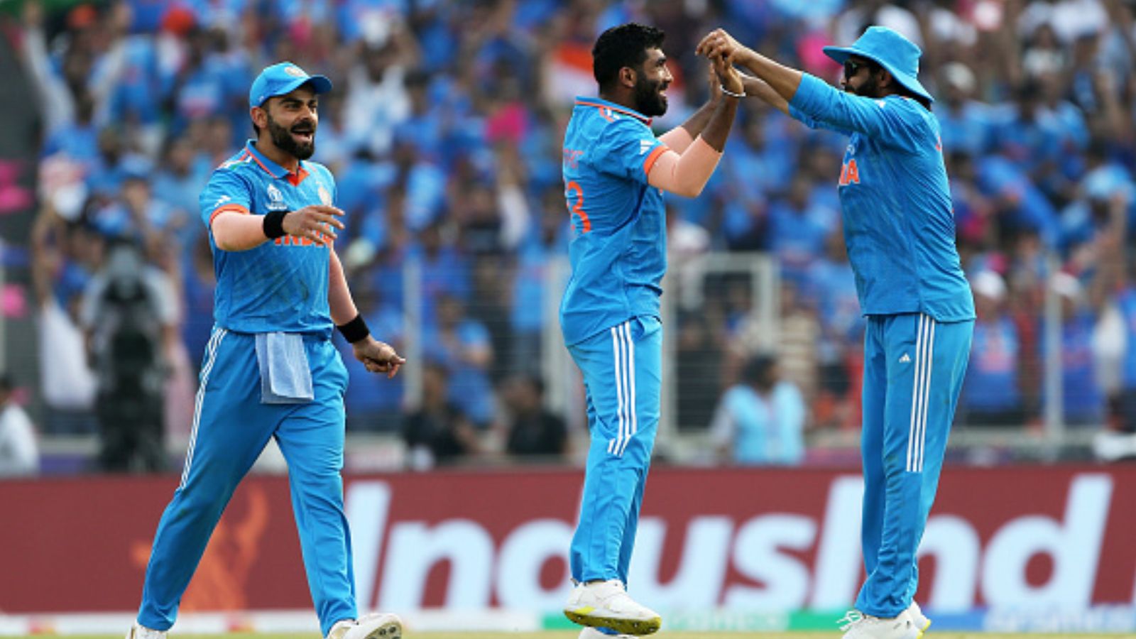 Virat Kohli or Jasprit Bumrah, Who will be rested for clash against Netherlands? Rahul Dravid drops big hint on India's playing XI India's star players Virat Kohli (left), Jasprit Bumrah (centre) and Ravindra Jadeja in this frame. (Getty)