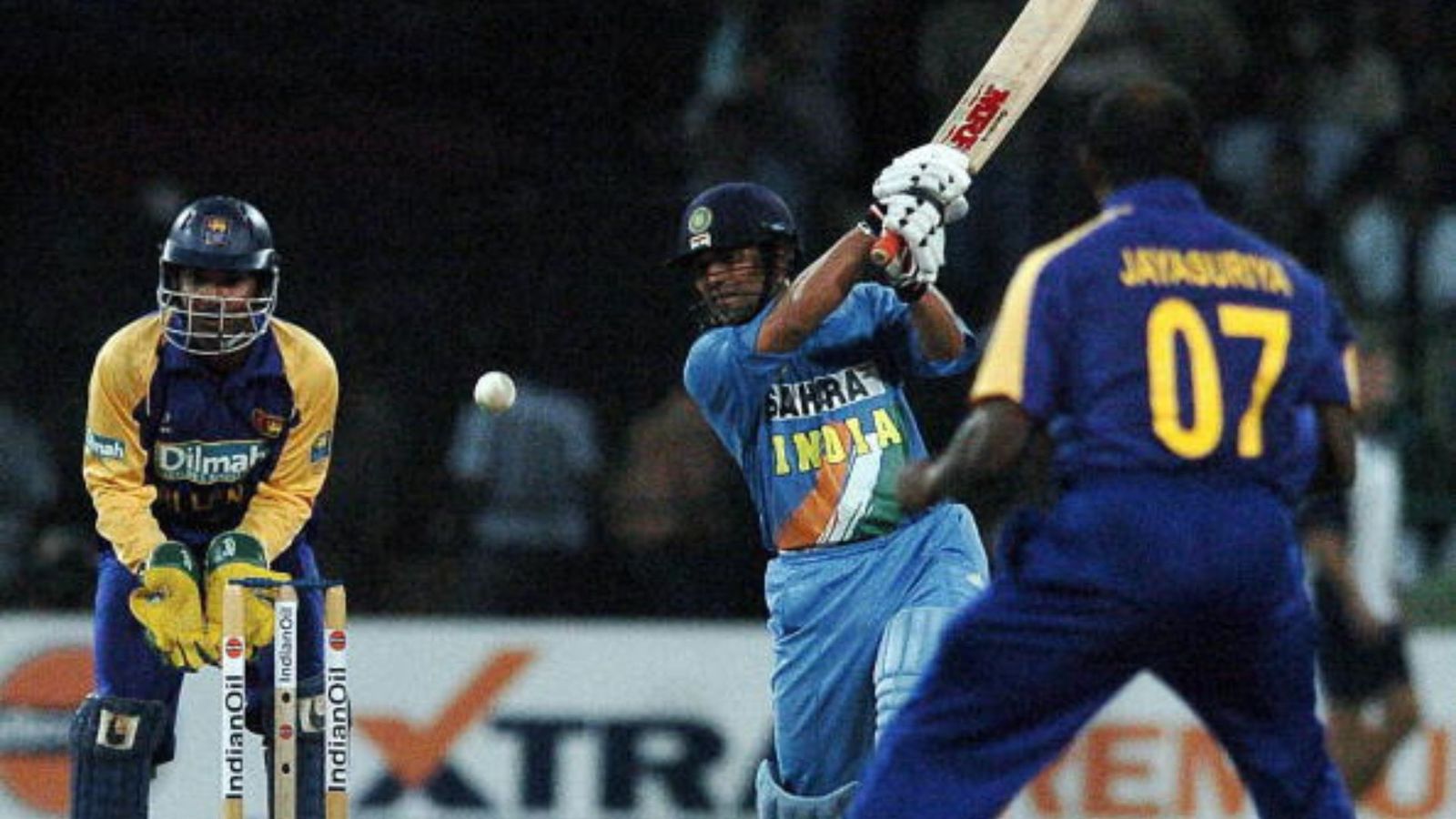 'Sachin Tendulkar runs and centuries would have doubled': Sanath Jayasuriya makes huge claim on current ICC rules Indian batsman, Sachin Tendulkar (C) plays a stroke as Sri Lankan wicketkeeper Kumar Sangakkara (L) and teammate Sanath Jayasuriya (R) look on at the R. Premadasa International Cricket Ground in Colombo, 01 August 2004.