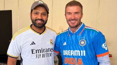 Rohit Sharma and David Beckham swap jerseys in heartwarming gesture following IND vs NZ's World Cup semifinal, See Pics Indian cricket captain Rohit Sharma with football legend David Beckham in this frame. (Getty)