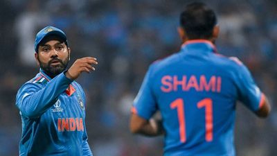 New rule: ICC introduces 5-run penalty for bowling side in ODIs & T20Is if next over doesn't start within 60 seconds Indian captain Rohit Sharma handing the ball to Mohammed Shami during World Cup 2023 clash (Getty Images)