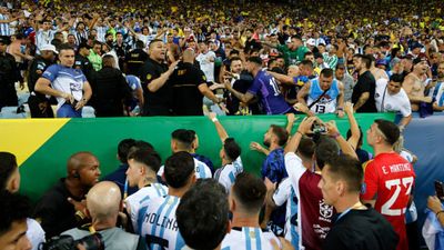 ‘This can’t be tolerated’: Lionel Messi backs Argentina fans after crazy scenes in stands during World Cup qualifier Lionel Messi of Argentina and teammates react as police officers clash with fans prior to a FIFA World Cup 2026 qualifier match between Brazil and Argentina at Maracana Stadium. (Getty Images)