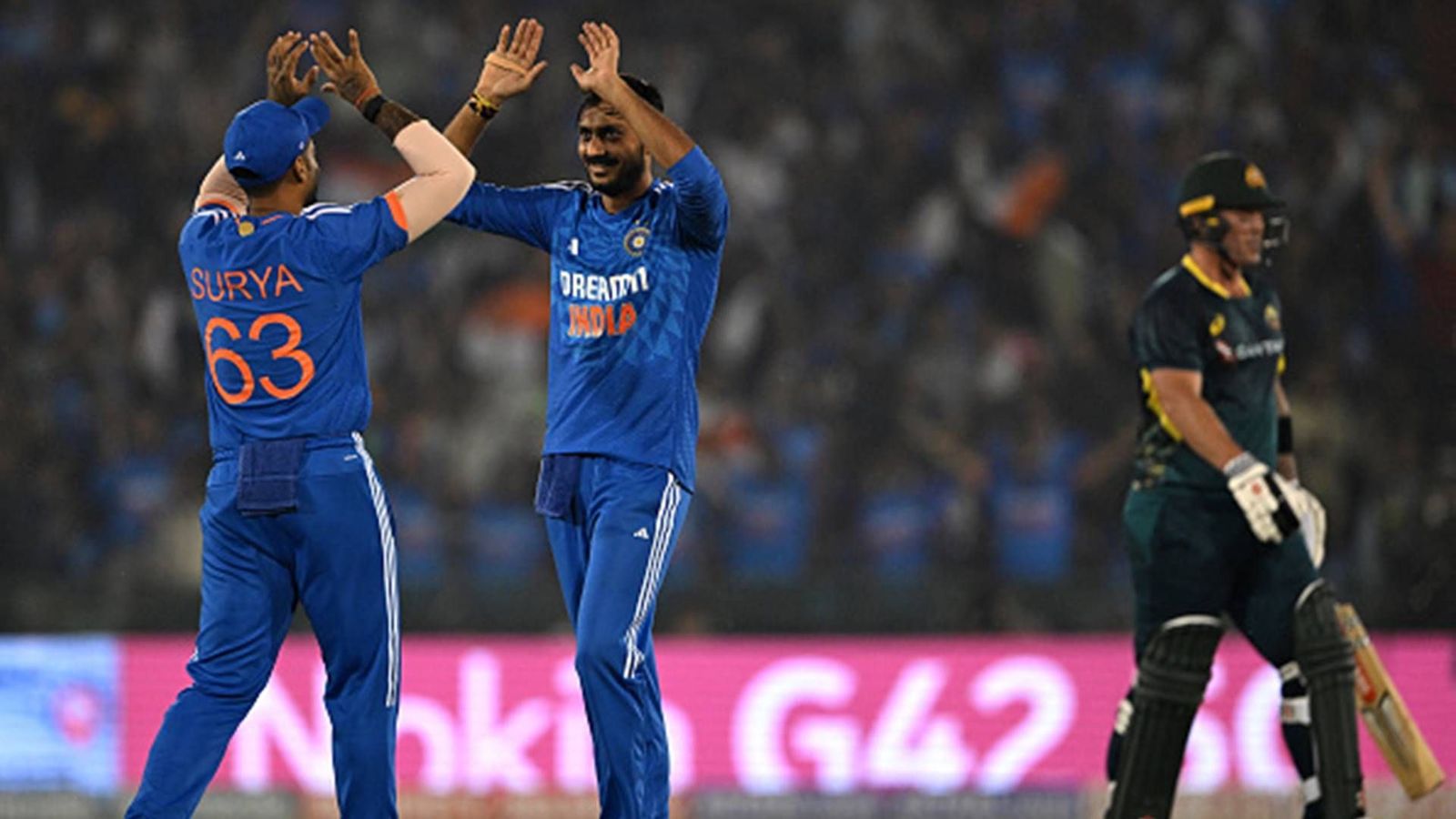 Dropped from T20I squad for South Africa, Axar Patel takes 3 for 16 to help India beat Australia by 20 runs and clinch series Axar Patel celebrates a wicket with Suryakumar Yadav during fourth T20I (Getty Images)