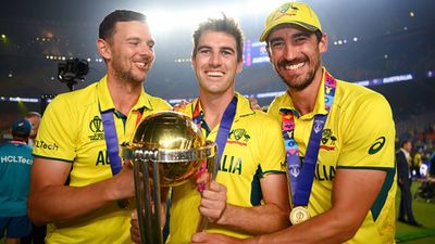 Australia's 7 World Cup 2023 winners set Rs 2 crore base price as 1,166 players register for IPL 2024 auction Josh Hazlewood, Pat Cummins and Mitchell Starc posing with World Cup 2023 trophy (Getty Images)