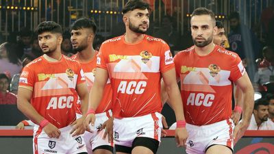 Pro Kabaddi League: Gujarat Giants prevail over U Mumba in final minutes of closely fought contest to make it three in three Fazel Atrachali and his teammates celebrate a point vs U Mumba.