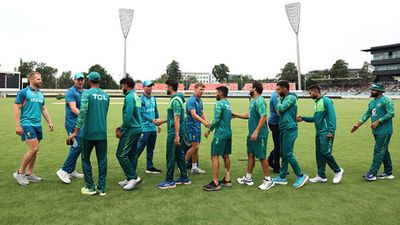 After an electrical storm in Canberra, Day 4 of Pakistan's warm-up game abandoned because of BBL match Players shake hands after the match is drawnduring day four of the tour match between PMs XI and Pakistan at Manuka Oval on December 09 (Getty Images)