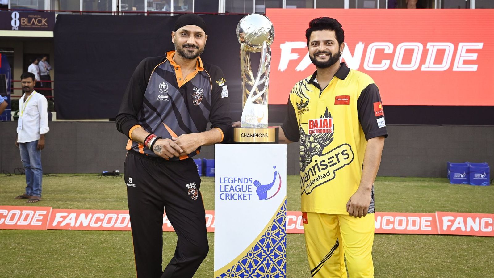 LLC: Sri Lankan batters help Harbhajan Singh-led Manipal Tigers seal trophy with 5-wicket win over Suresh Raina's Urbanrisers Hyderabad Former India players Harbhajan Singh and Suresh Raina with the LLC Trophy.