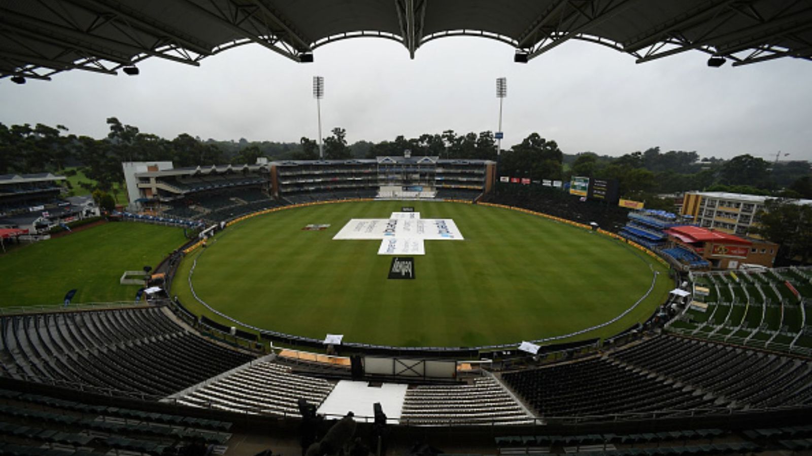 IND vs SA, 3rd T20I Weather Report: With players tired of damp conditions, will rain affect Johannesburg game? Know here The covers on the field at the Wanderers in Johannesburg.