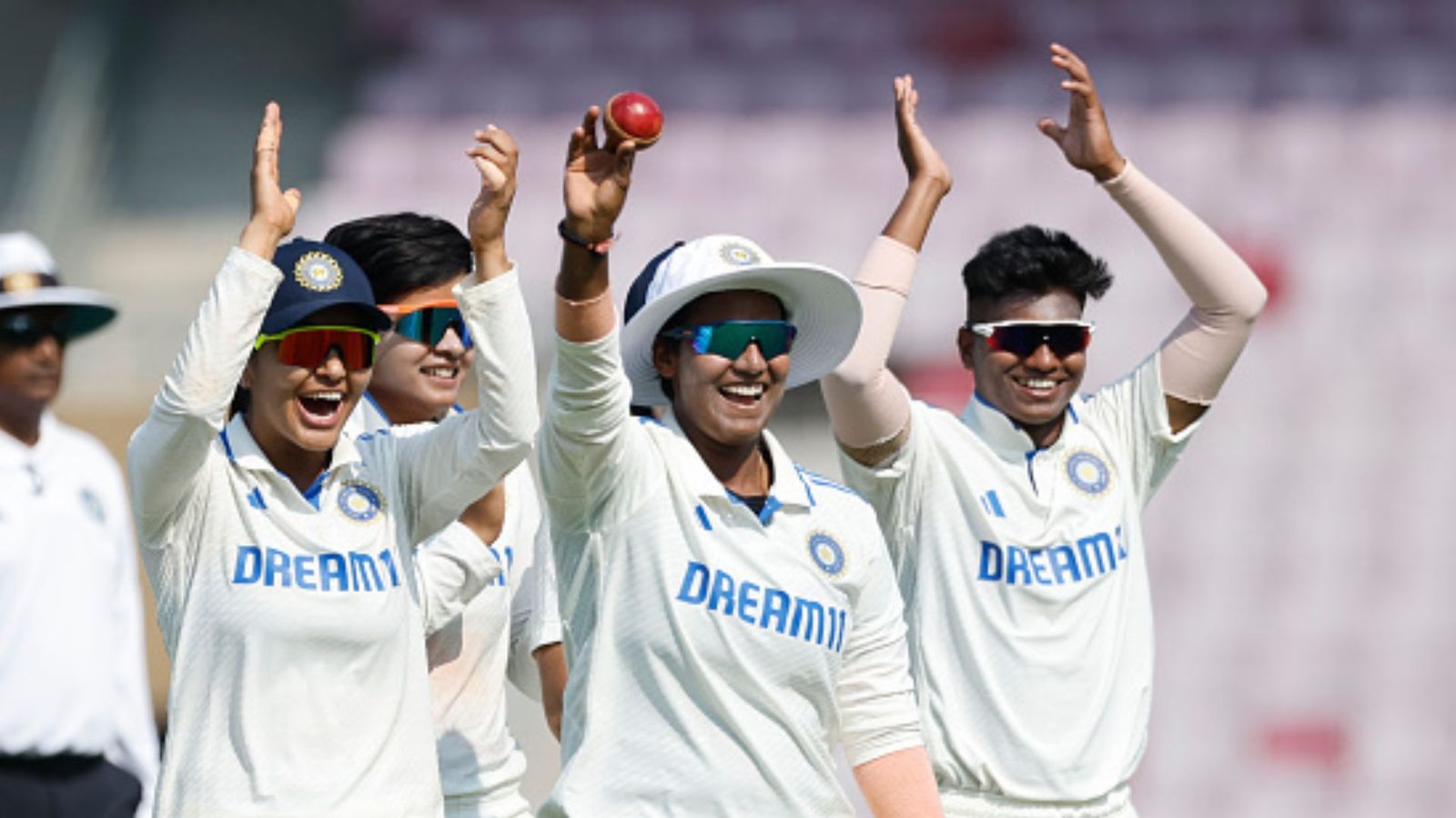 IND-W vs ENG-W: Deepti Sharma's robust fifer skittles out England for paltry 136 as India on cusp of record Test triumph Deepti Sharma (centre) is all smiles after recording a fifer against England in the one-off Test match.