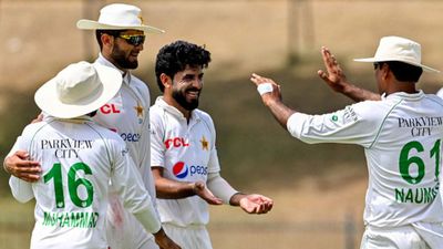 ‘People were pushing me to stop playing cricket…driving a taxi’: Debutant pacer Aamer Jamal reveals his journey after six-wicket haul vs Australia Pakistan's Aamer Jamal (2R) with his teammates in this frame. (Getty Images)