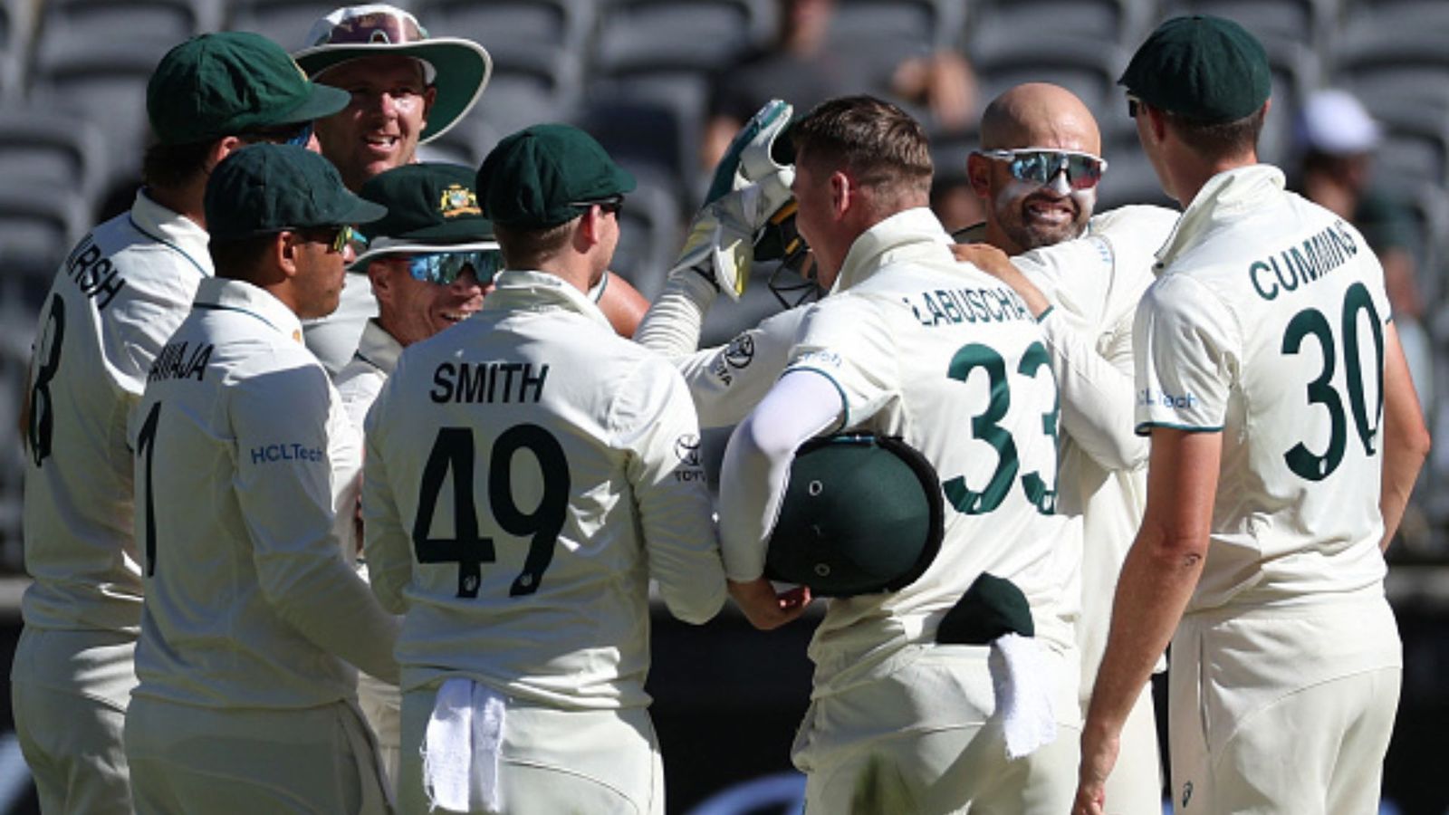 AUS vs PAK: Nathan Lyon breaches 500-wicket mark as Australia embarrass Pakistan in Perth, register 360-run win Nathan Lyon celebrates with teammates.