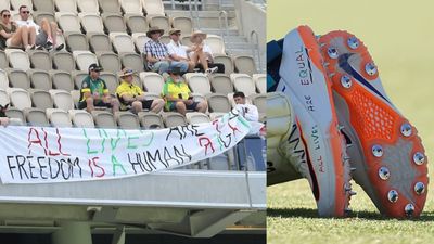 AUS vs PAK: Spectators evicted for showing banner similar to message on Usman Khawaja's shoes during Perth Test Fans displayed a banner in Perth bearing the same message as Usman Khawaja's shoes. (Photo Courtesy: Twitter)