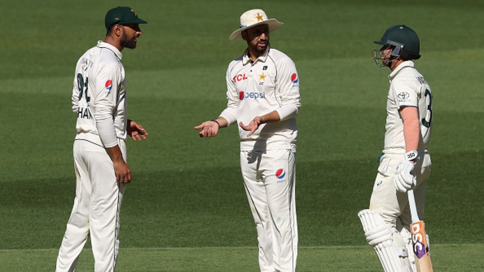 ‘We could’ve scored quicker…60-70 runs would have proved’: Shan Masood points out Pakistan’s mistake in Perth Test Shan Masood of Pakistan speaks with Salman Ali Agha of Pakistan as David Warner of Australia listens. (Getty Images)