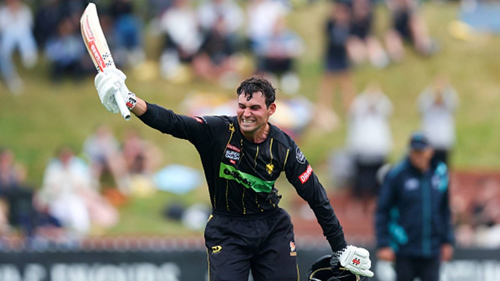New Zealand's 21-year-old batting sensation smashes 139 off just 64 balls but falls 3 runs short of breaking ex-RCB player's record Wellington Firebirds' opener Tim Robinson celebrates his century in Super Smash 2023-24 (Getty Images)