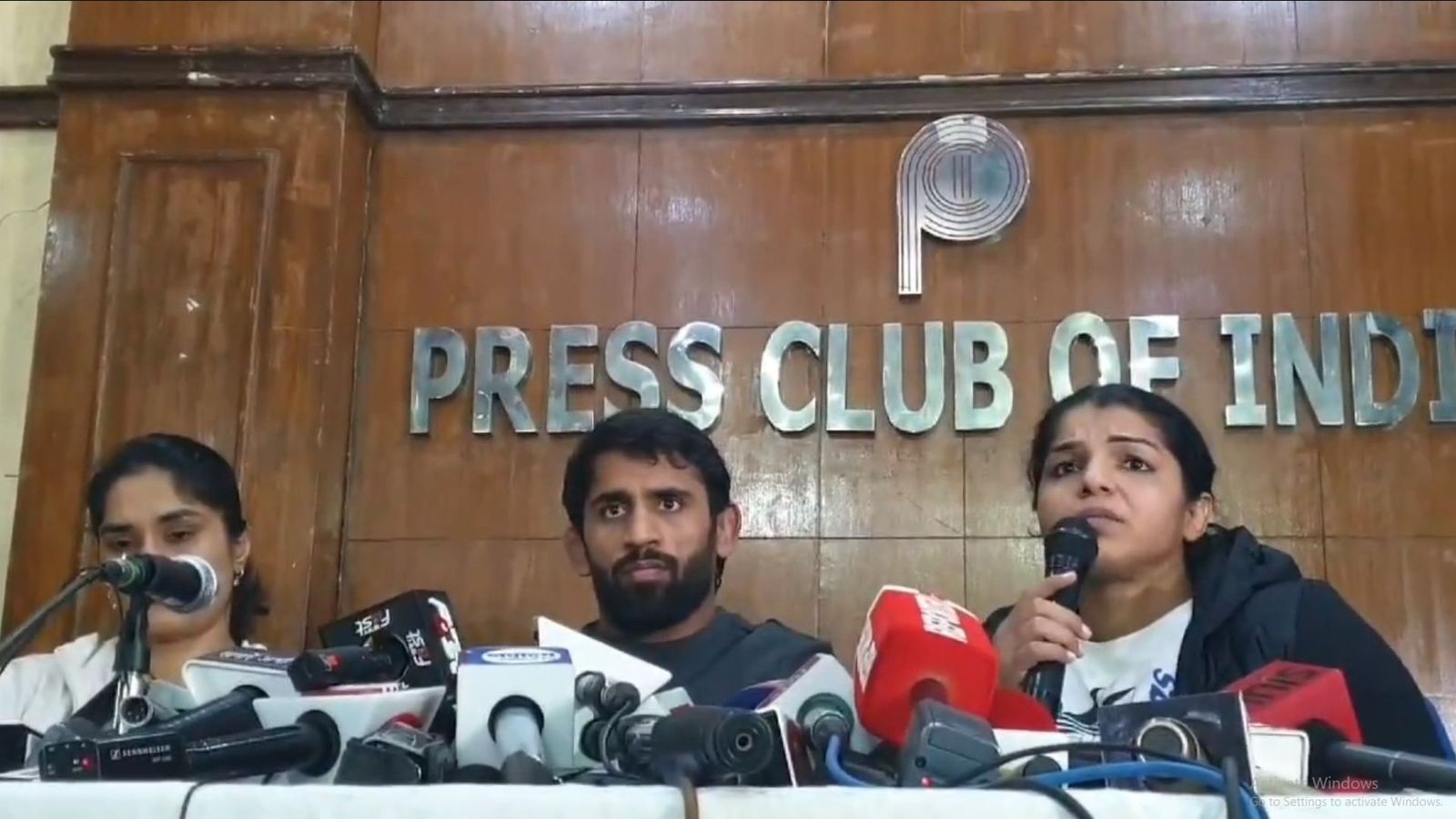 Sakshi Malik announces retirement from wrestling as Brij Bhushan associate wins WFI election, says 'we slept 40 days on the roads' Wrestlers Vinesh Phogat (Left), Bajrang Punia (Middle) and Sakshi Malik (Right). (Screengrab: Twitter)
