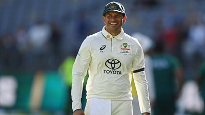 ICC punishes Usman Khawaja for sporting black armband in support of Palestine without permission in Perth Test Usman Khawaja sporting black armband during Perth Test against Pakistan (Getty Images)
