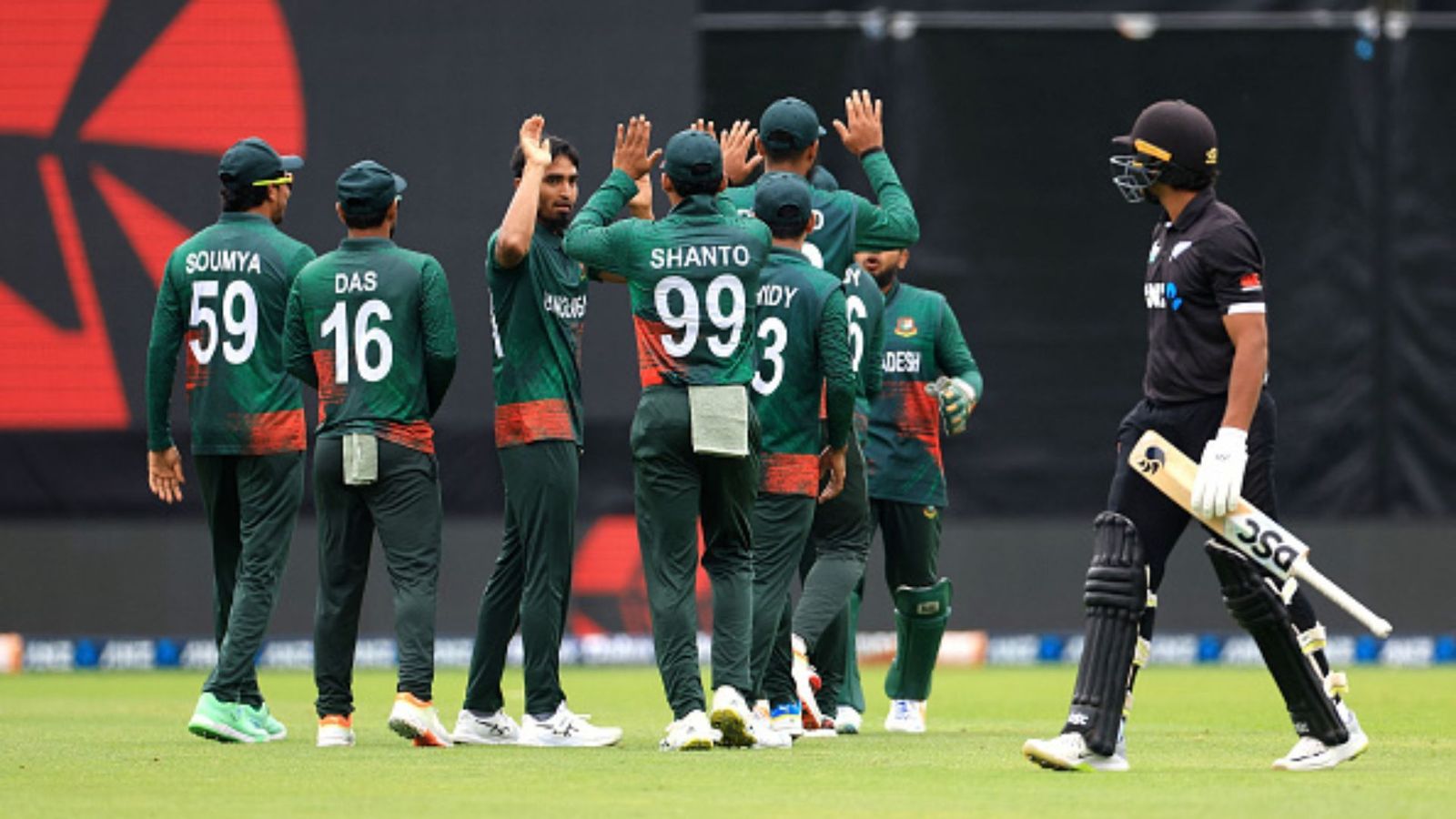 NZ vs BAN: Bangladesh salvage pride in stunning style, bowl out New Zealand for 98 runs to win 3rd ODI by 9 wickets with 209 balls to spare New Zealand's Rachin Ravindra (R) walks from the field after being caught as Bangladesh players celebrates.