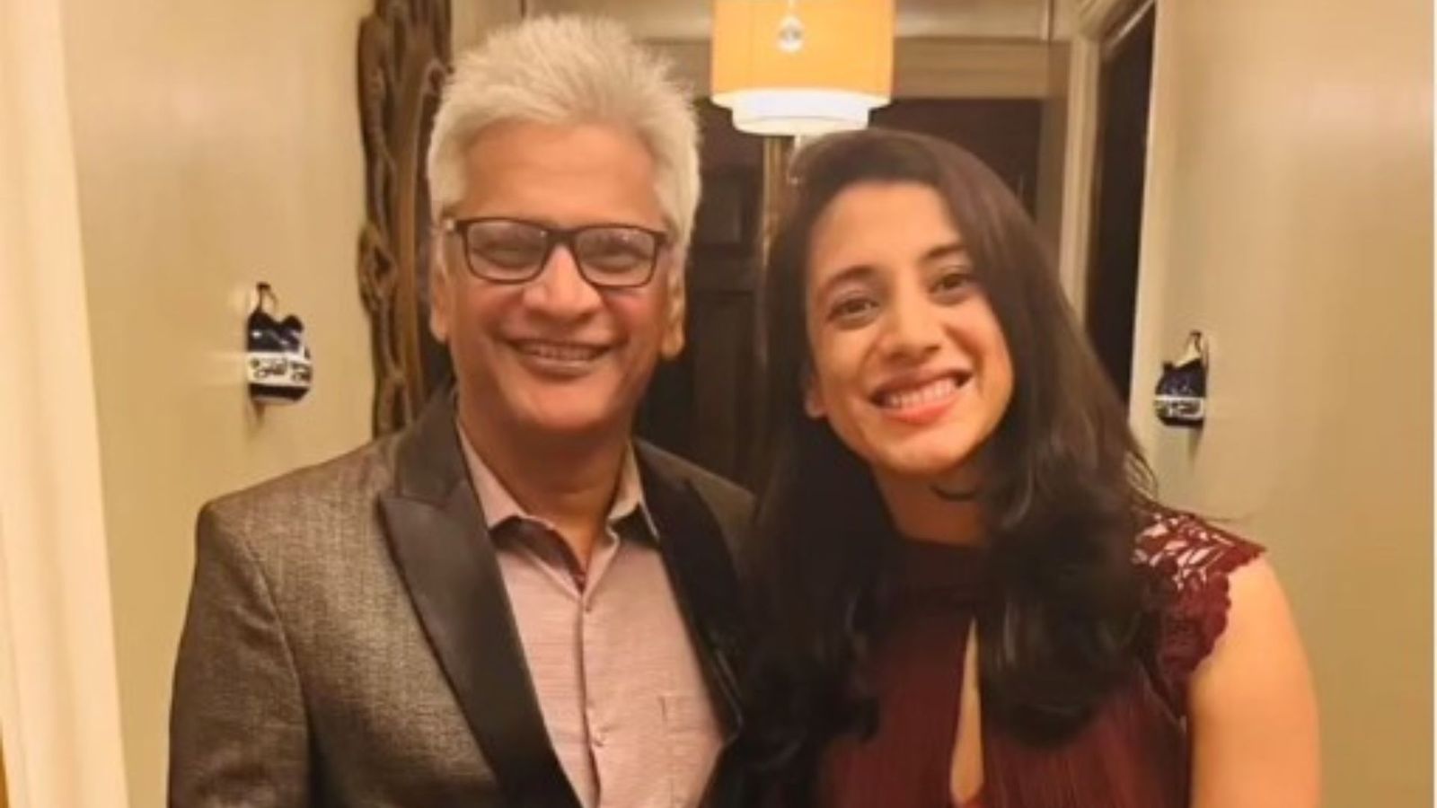‘My father didn't get…’: Smriti Mandhana unfolds her cricket journey on the sets of Kaun Banega Crorepati Indian cricketer Smriti Mandhana with her father. (Screengarab: Instagram/Smriti Mandhana)