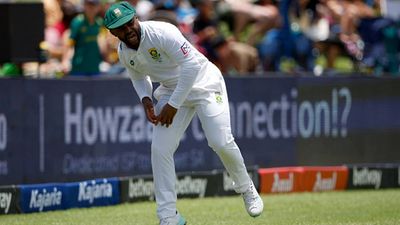 Bavuma suffers hamstring injury trying to stop boundary off Virat Kohli's bat, CSA releases statement on whether he will bat or not Temba Bavuma struggles as he picks up a hamstring injury while chasing a ball in Boxing Day Test (Getty Images)