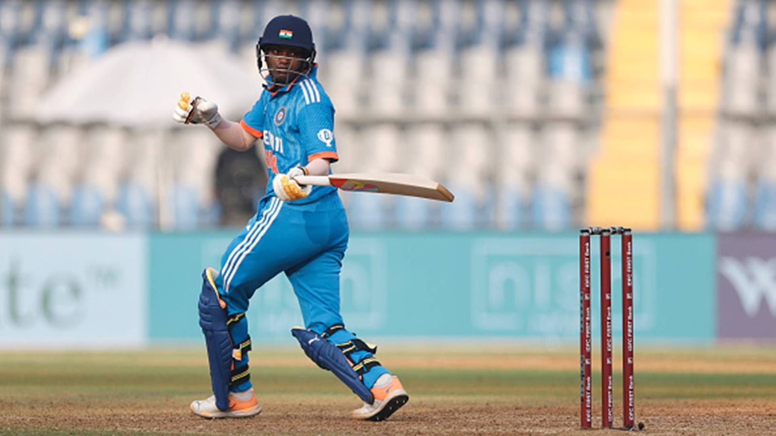 Pooja Vastrakar breaks all-time ODI record with unbeaten 62 against Australia in first ODI Pooja Vastrakar plays a shot against Australia in the first ODI (Getty Images)
