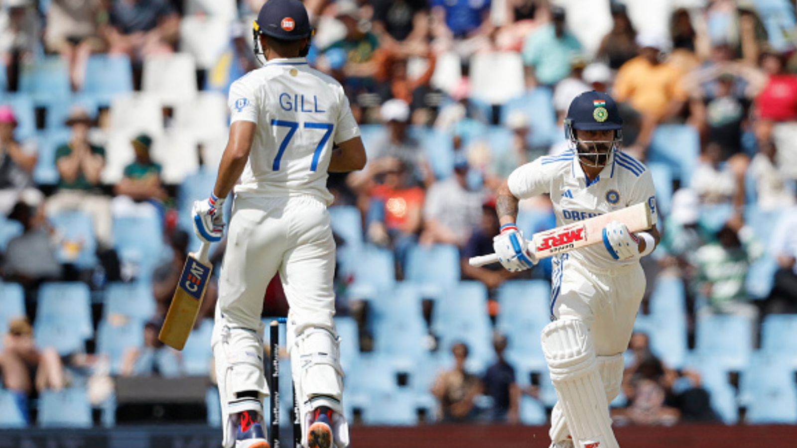 'He's a big question mark. His place in Test XI…': Dinesh Karthik's bold judgement on India star after Centurion Test fiasco India's Virat Kohli (R) and Shubman Gill run between the wickets during Day 3 of the 1st Test against South Africa. (Getty)