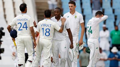 Big blow to Team India, Rohit's brigade docked with crucial WTC points after this rule breach during 1st Test vs SA South Africa's Kagiso Rabada (C) greets India's Virat Kohli (2nd L) after South Africa won the first Test at SuperSport Park on December 28. (Getty)