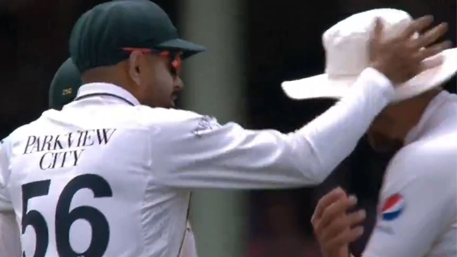 Watch: Babar Azam slaps Salman Ali Agha on the field following a discussion during 3rd Test against Australia Babar Azam (left) slaps Salman Ali Agha jokingly on Day 3 of the 3rd Test against Australia. (Screengrab: Twitter)