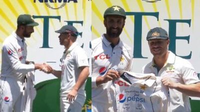 WATCH: Shan Masood gifts retiring David Warner Babar Azam's jersey signed by Pakistan team after Test series drubbing Pakistan skipper Shan Masood (left) gifting Babar Azam's jersey signed by Pakistan team to David Warner after 3rd Test at SCG. (Screenshot-Twitter)