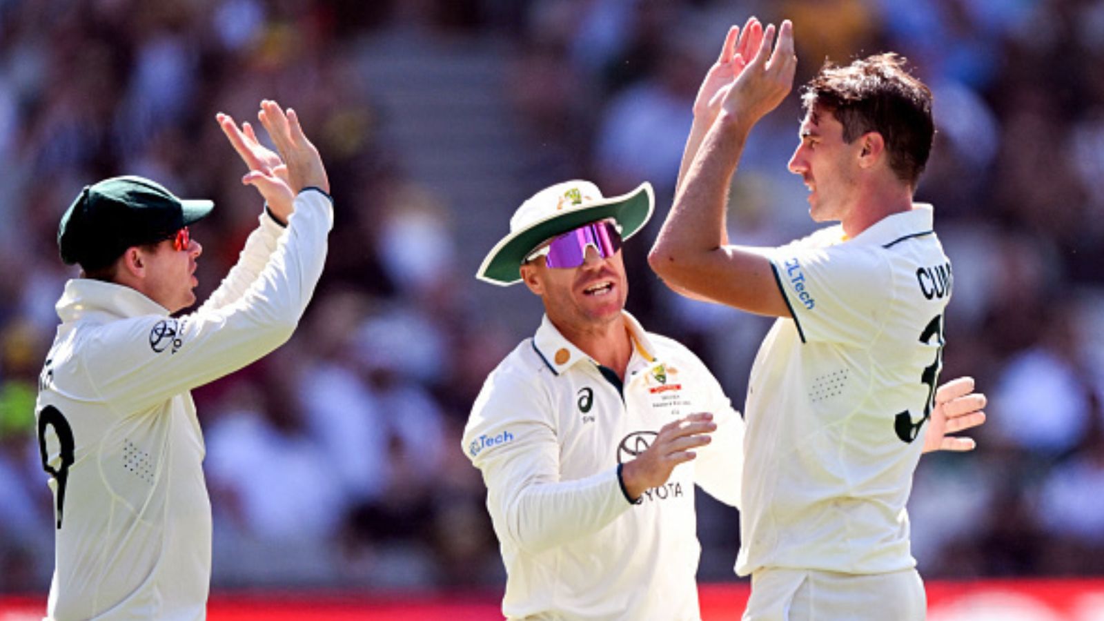 'It’s going to be...': Pat Cummins' big statement on David Warner's replacement following star opener's last dance in Tests Australia's star opener David Warner (centre) with his teammates in this frame. (Getty)