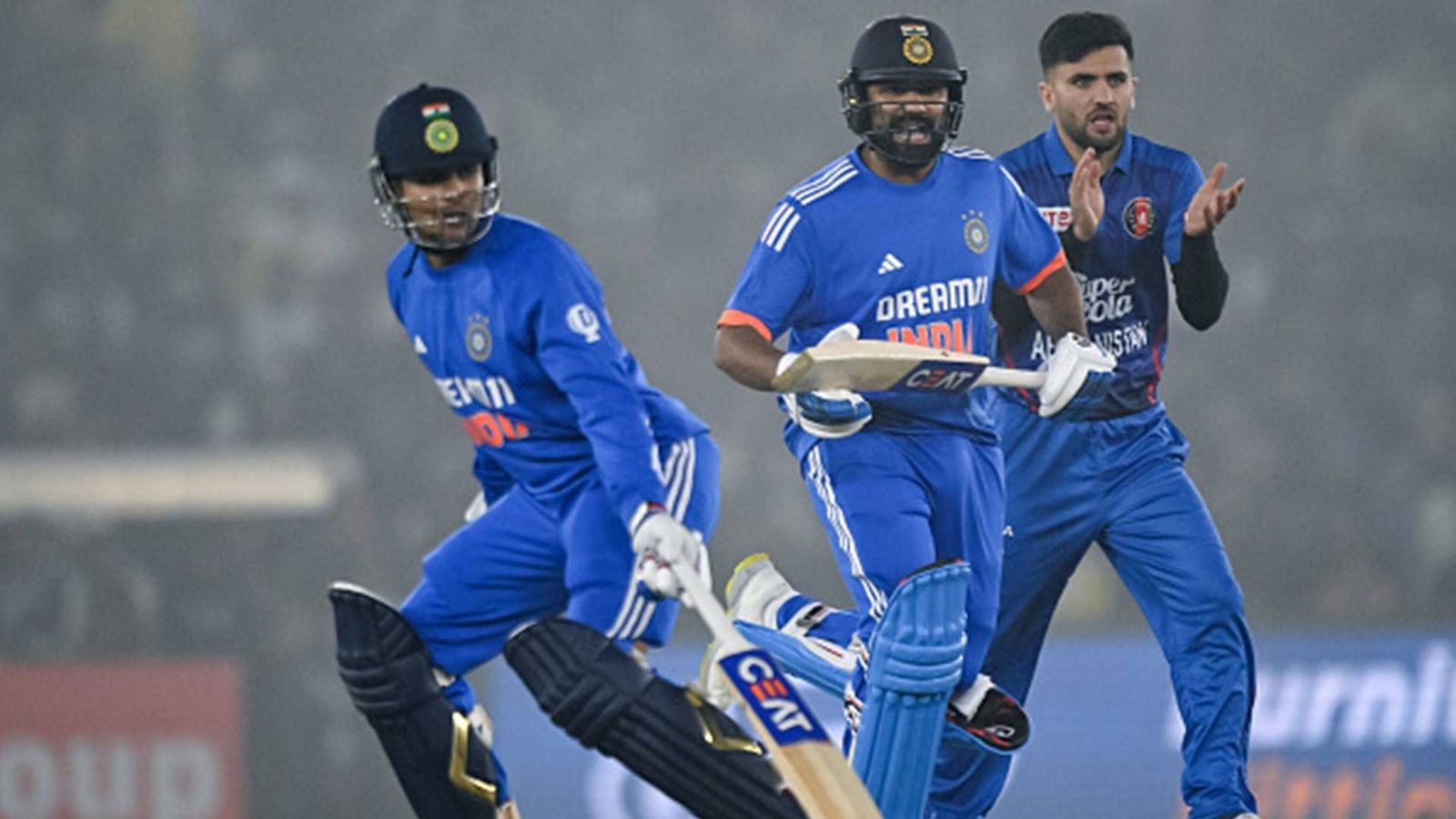 'I wanted Gill to...': Rohit Sharma reveals what went through his mind after getting run out for two-ball duck in T20I comeback Indian openers Rohit Sharma and Shubman Gill alongside Afghanistan pacer Fazalhaq Farooqi (Getty Images)