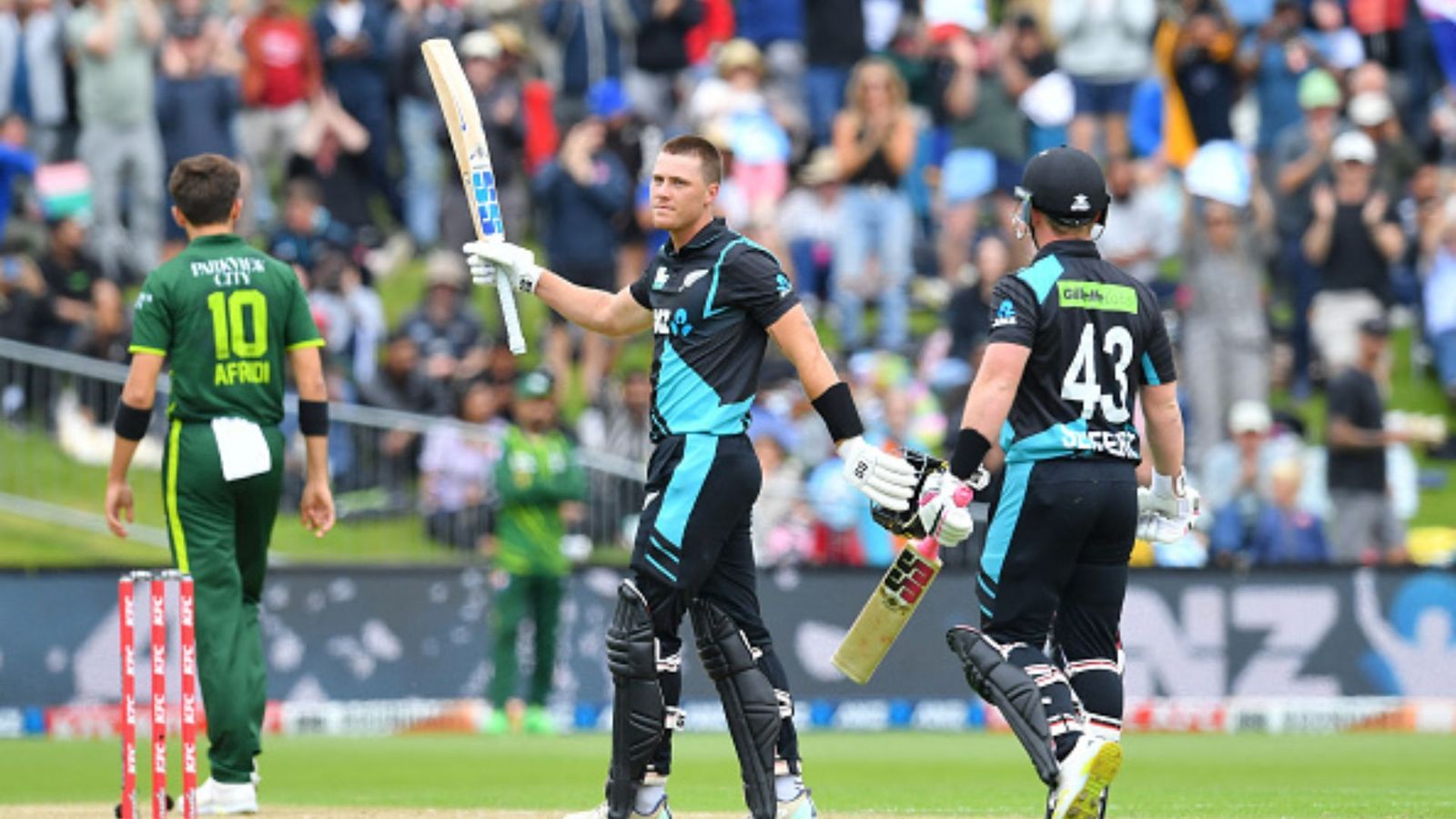 NZ vs PAK: Pakistan bowlers surrender as Finn Allen whacks 16 sixes in 137-run knock, Afridi and Rauf combine to concede a mind-boggling 103 runs in 8 overs Finn Allen (C) celebrates after scoring a century during the third T20I match between New Zealand and Pakistan.