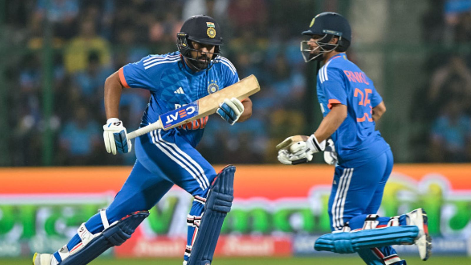 India have last laugh against Afghanistan in 3rd T20I after 'Double Super Over' drama, pip Pakistan to script World Record India's Rohit Sharma and his teammate Rinku Singh (right) run between the wickets during 3rd T20I against Afghanistan in Bengaluru on January 17. (Getty Images)