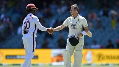 AUS vs WI: Australia demolish West Indies by 10 wickets in Adelaide Test after Travis Head's ton and Josh Hazlewood's 9 wickets Australia's Steve Smith (R) shakes hands with Tagenarine Chanderpaul of West Indies.