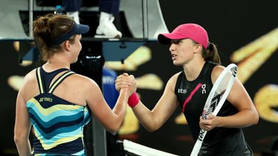 Big Upset: World no.1 knocked out of Australian Open 2024 after facing shocking defeat against unseeded teenager Czech Republic's Linda Noskova (L) embraces Iga Swiatek of Poland after winning in third round of the Australian Open 2024's women's single on January 20. (Getty)