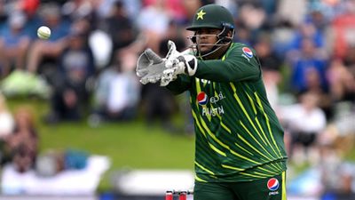 'Either you kick me out entirely...': Azam Khan lambasts Pakistan Cricket Board for not giving him a fair chance Pakistan's Azam Khan catches the ball during 3rd T20I against New Zealand on January 17. (Getty)