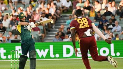 Glenn Maxwell's fiery ton after hospital drama propels Australia to 34-run win over West Indies in 2nd T20I, seal series 2-0 Australia's Glenn Maxwell (left) hits a six off West Indies' Jason Holder during the 2nd T20I in Adelaide on February 11. (Getty)